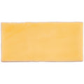 A rectangular solid yellow ceramic straw half tile wall tile with a smooth slightly glossy finish