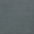 A matte-finished dark gray porcelain tile with subtle texture from the stucco porcelain textured blue collection