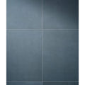 Dark gray matte finish porcelain square tiles arranged in a grid from the stucco porcelain textured blue collection