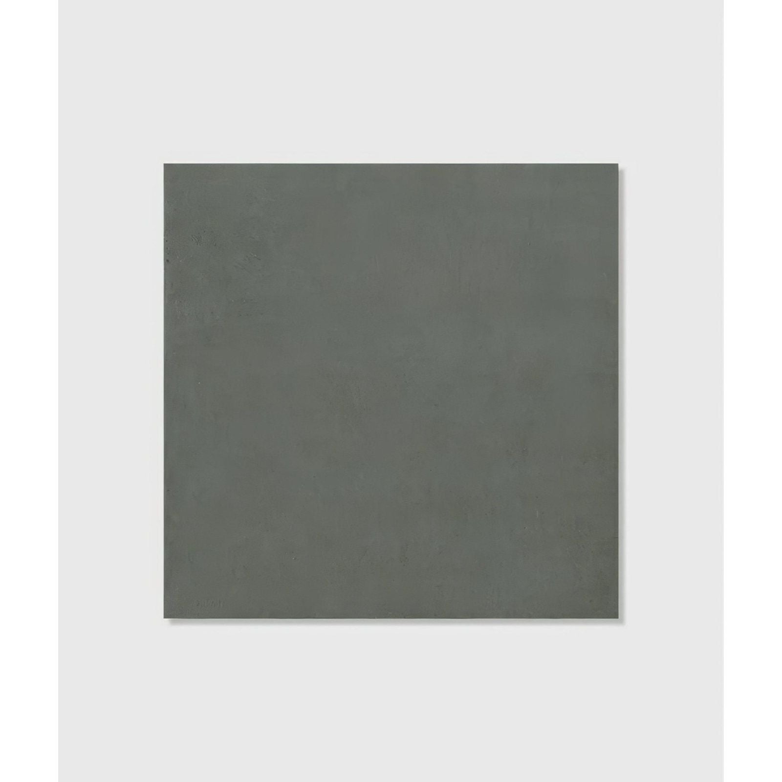 A matte-finished dark gray square stucco porcelain tile with subtle texture designed for durable wall and floor use