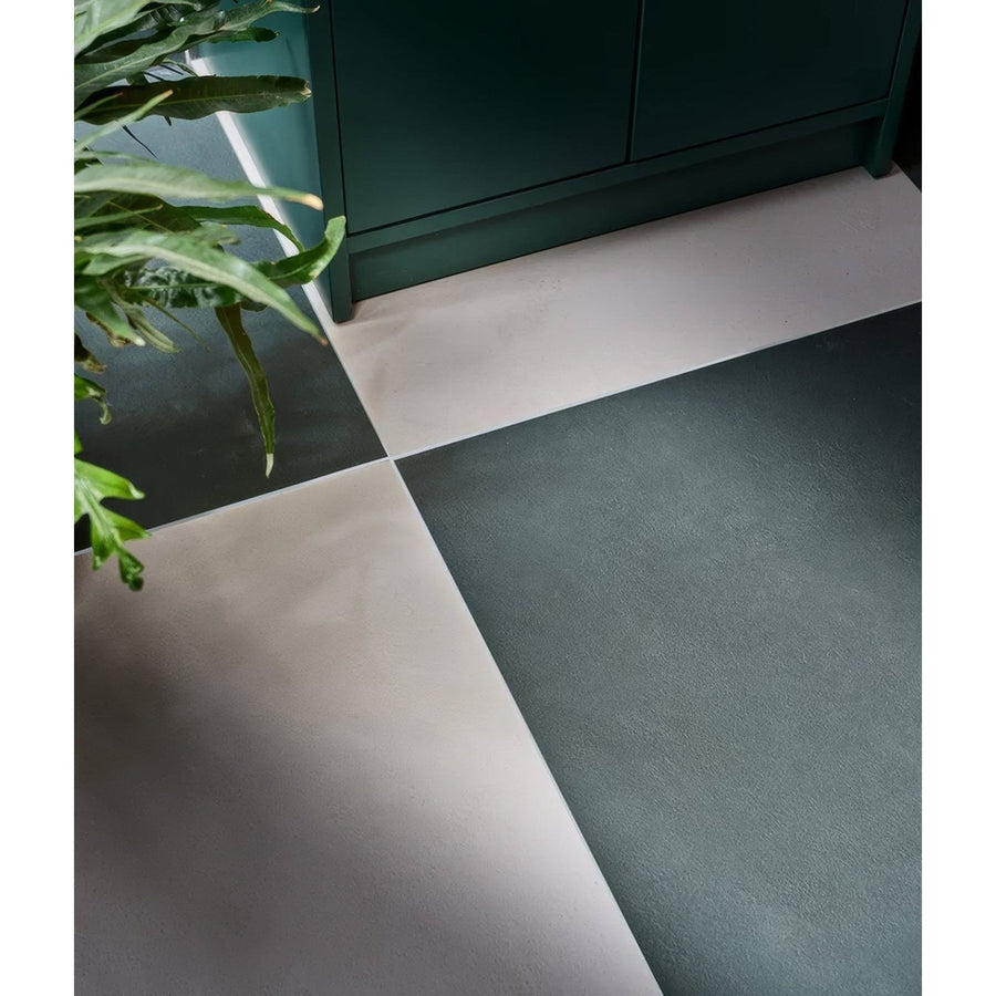Stucco porcelain textured ivory floor tiles in dark green and light gray matte finish arranged in a geometric pattern