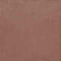 A smooth matte-finished terracotta stucco porcelain tile with subtle texture ideal for flooring and walls