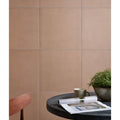 Beige matte-finish stucco porcelain textured tan ceramic wall tiles arranged in a clean grid pattern