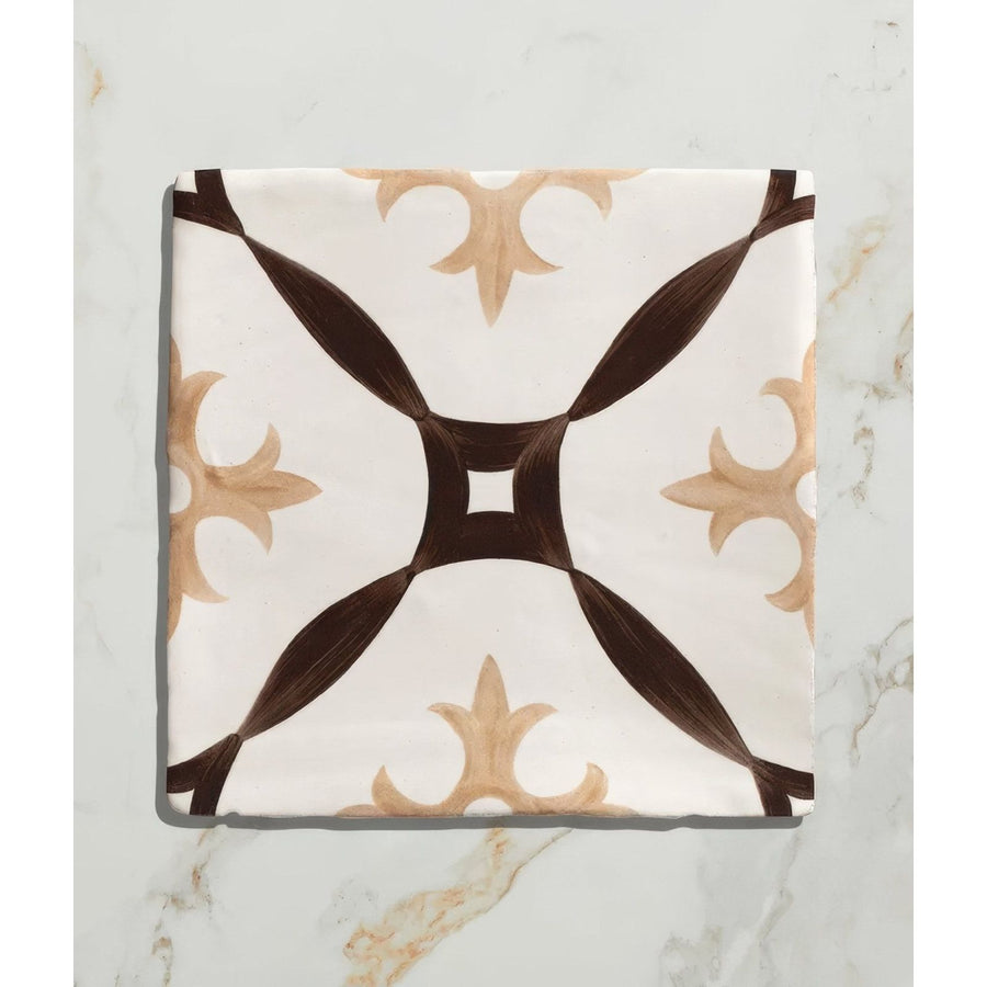 Studio abbey brown ceramic square tile with white base and dark brown tan ornate cross like decorative pattern