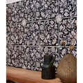 Studio assisi blue ceramic black and white floral patterned ceramic tiles ideal for decorative wall applications