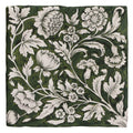 Studio Assisi Green ceramic tile with dark green color and intricate white floral art nouveau patterns