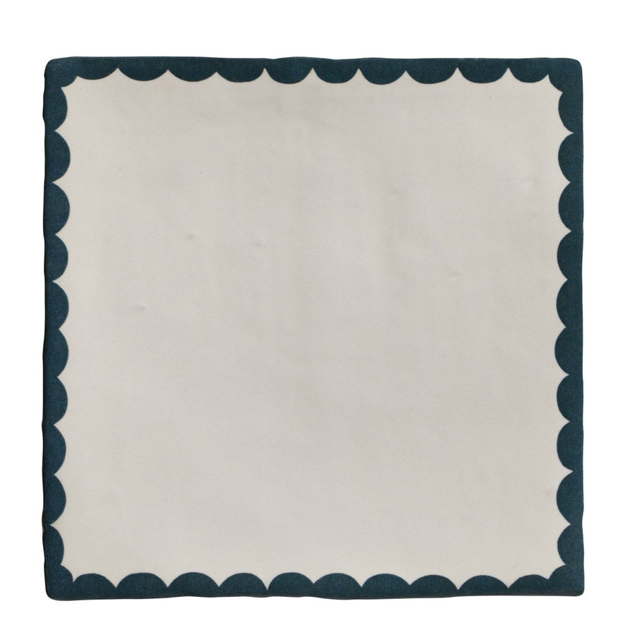 Cream-colored square handkerchief with dark teal scalloped border from Studio Bobbin ceramic blue collection