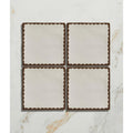 Set of four cream-colored ceramic coasters with dark brown scalloped edges from Studio Bobbin Ceramic Chocolate collection