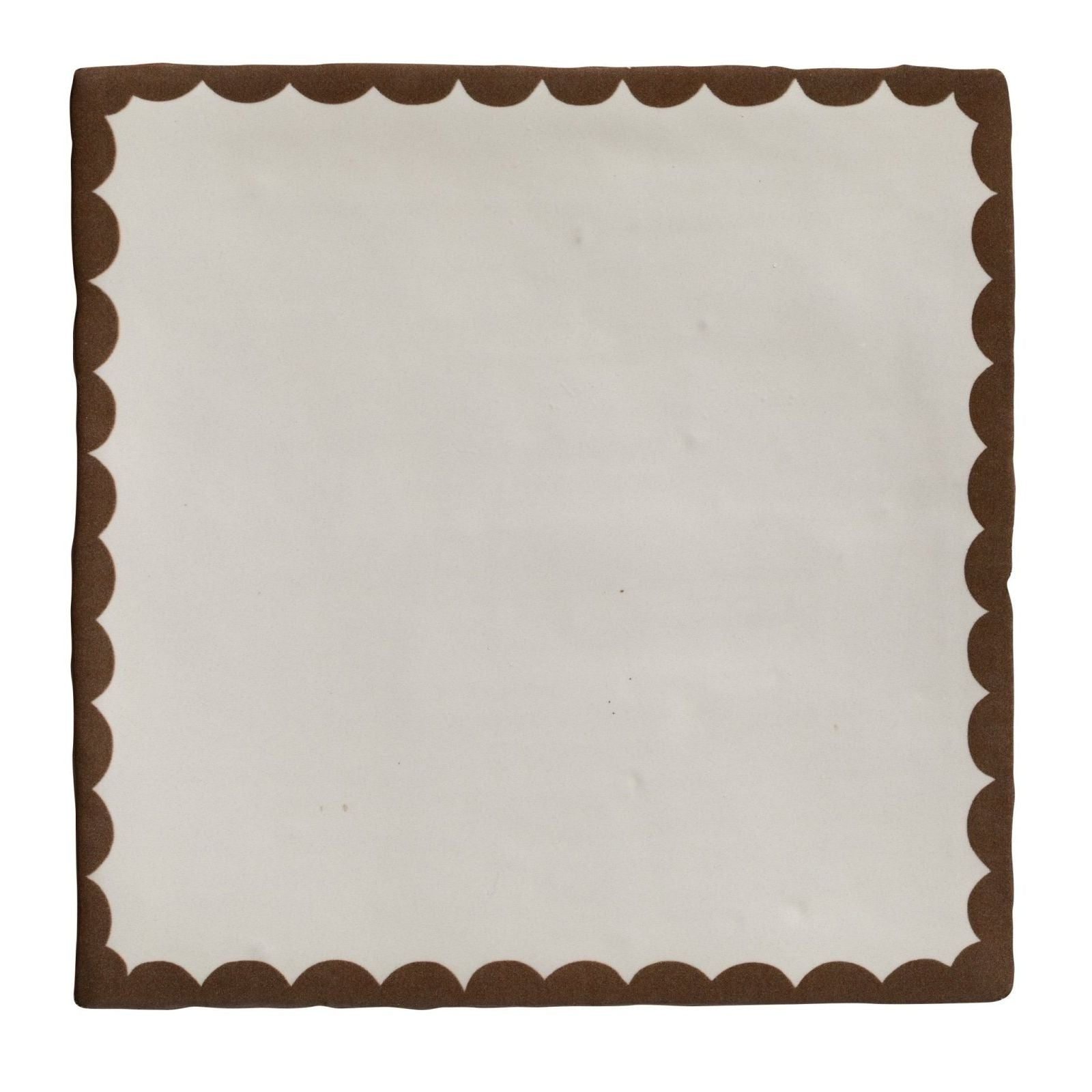 Cream-colored ceramic square napkin with scalloped brown border from studio bobbin chocolate collection