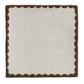 Cream-colored ceramic square napkin with scalloped brown border from studio bobbin chocolate collection