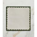 Studio bobbin ceramic holly olive green scalloped-edge square placemat with cream-colored center for dining use