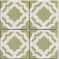 Four square studio cassius light green ceramic tiles with sage green and white geometric pattern