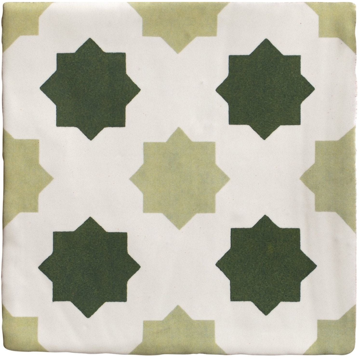 Studio cosmos jardin ceramic square tile with white base and geometric dark green eight-pointed star pattern