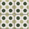 Square ceramic studio cosmos jardin tile with white base olive green accents and dark forest green star patterns