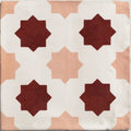 A square studio cosmos zagora ceramic tile featuring a deep red and soft pink geometric star pattern on white