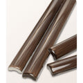Brown wood-grain ceramic baseboard trim pieces from Studio Jamboree handpainted ceramic chocolate beading collection
