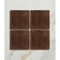 Set of four square dark brown wooden coasters with visible wood grain texture for studio jamboree handpainted ceramic chocolate field