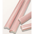 Studio jamboree handpainted ceramic coral beading pink ceramic baseboard trim with subtle wood grain texture and rounded edges