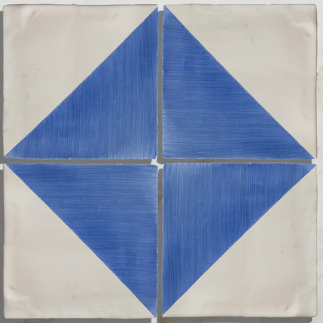 Studio Jamboree handpainted ceramic tile with blue and white geometric diamond pattern and textured brushstroke detailing