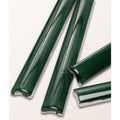 Dark green glossy handpainted ceramic tiles with smooth curved profile and rounded ends from studio jamboree holly beading