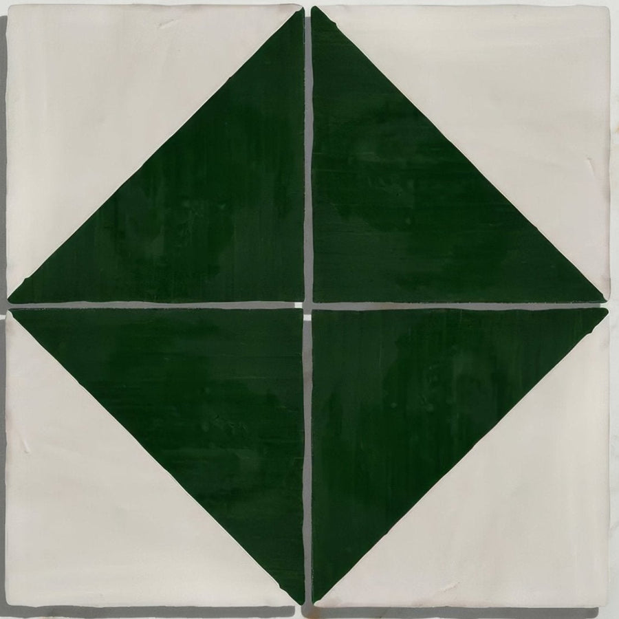 Studio Jamboree handpainted ceramic tile with bold dark green diamond pattern on off-white background
