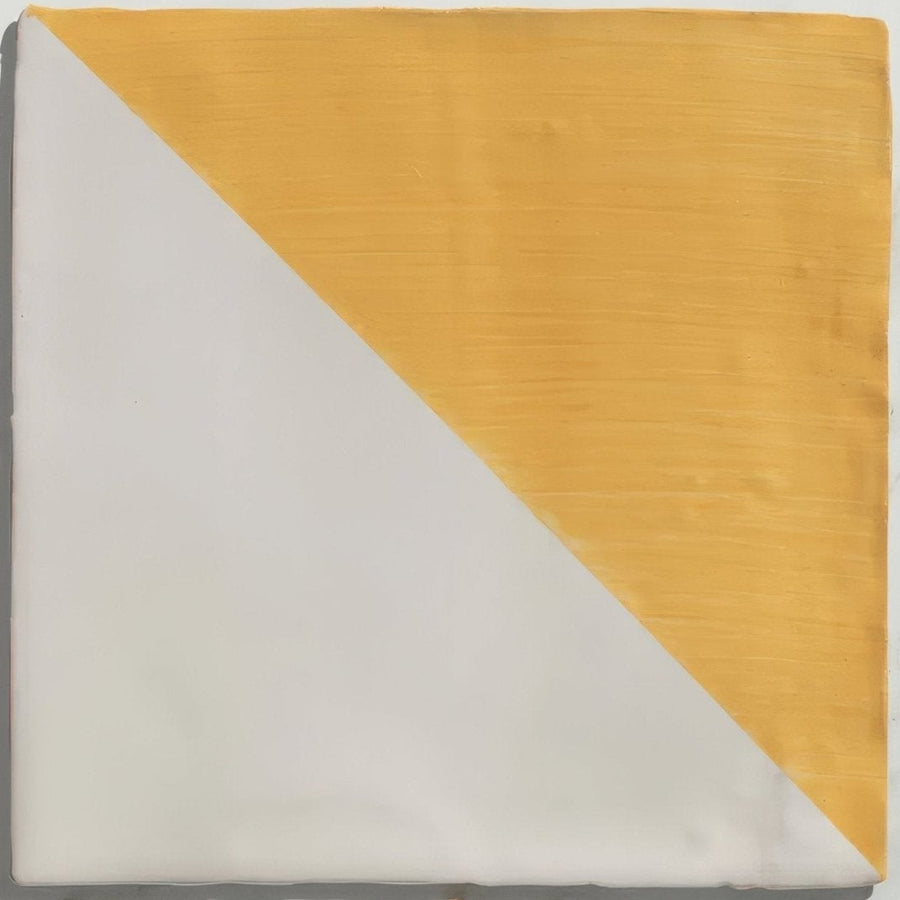 Studio Jamboree handpainted ceramic tile with a diagonal split in matte white and warm yellow summer tri design