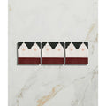 Three rectangular studio minaret pink dot ceramic tiles featuring black white maroon design with pink dots