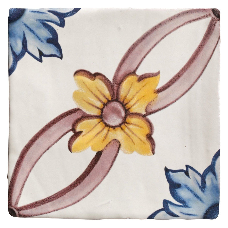Studio nonnas kitchen cornelia ceramic tile with hand-painted yellow flower and blue brown floral motifs on off-white background