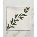 Off-white square pillowcase with hand-painted green botanical design by Studio Nonna’s Kitchen Floreale Ceramic