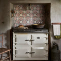 White enamel aga range with silver handles and vintage logo featured in Studio Nonna’s Kitchen Nuvola Melograno ceramic set