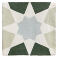 Square ceramic tile with geometric star pattern in dark green light gray and off-white from studio souk blue star ceramic