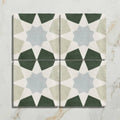 Four square studio souk blue star ceramic tiles with intricate star shaped geometric patterns in dark green gray blue and off white