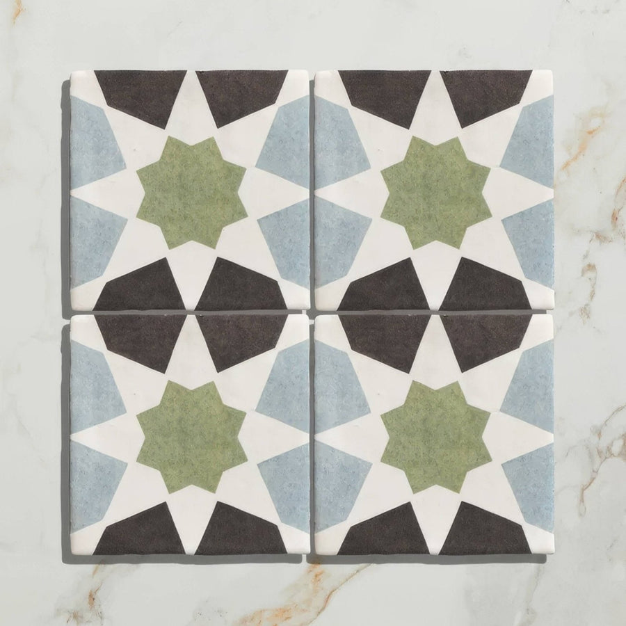 Studio souk green star ceramic four square ceramic tiles with olive green star geometric patterns on white background