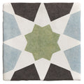 A square ceramic tile from studio souk featuring a geometric star pattern in muted green slate gray and light blue