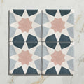 Studio souk pink star ceramic four square tiles with pink star navy blue and gray geometric patterns on white background