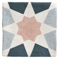 A square ceramic tile from Studio Souk pink star ceramic with a geometric star pattern in muted blue gray and soft pink tones