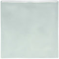 A square glossy light green ceramic tile with a smooth reflective surface from the sudbury field tile collection