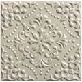 Cream-colored ceramic tile Sudbury Highgrove with raised ornate floral and scrollwork design for decorative use