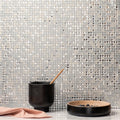 Shiny silver taj glass mosaic tile wall featuring subtle glittery texture ideal for decorative surfaces