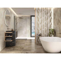 Támesis 1850 Land Matt beige marble-effect tiles with a freestanding bathtub