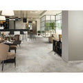 Gray marble-effect floor tiles with subtle veining in támesis 1850 light matt finish