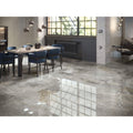 Shiny gray marble floor tiles with subtle veining and polished finish from Támesis 1851 Dark Polished collection
