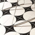 Black and white geometric patterned floor tiles with intersecting circles tao 1 black on dover white