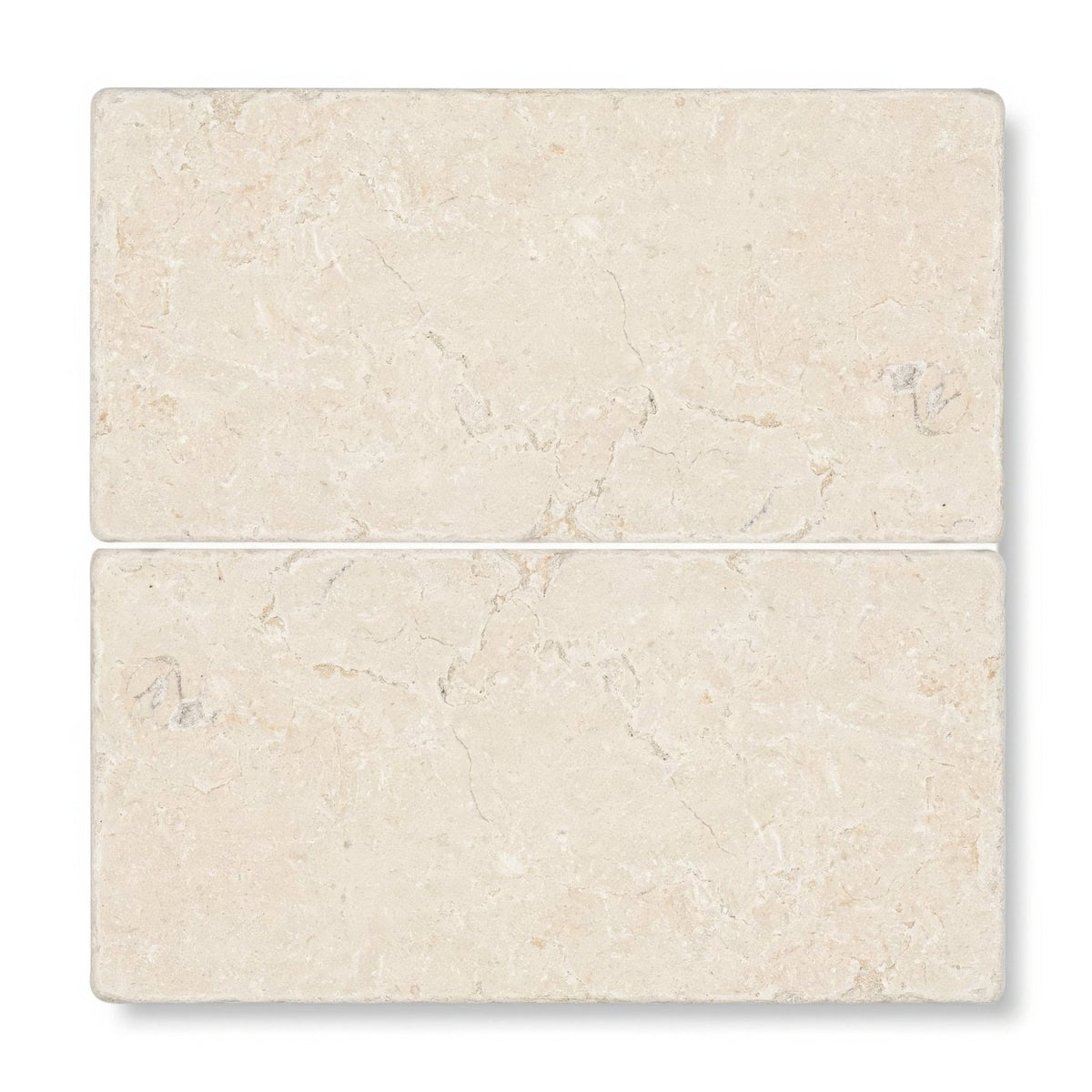 Cream-colored rectangular temple ezra 10 x 20cm tumbled stone tiles with subtle natural veining