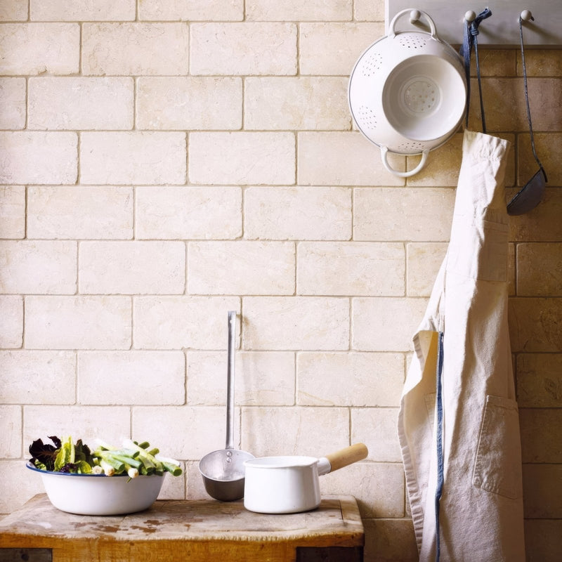 Temple Ezra 10 x 20cm tumbled white enamel colander with two handles and perforated sides hanging on wall rack
