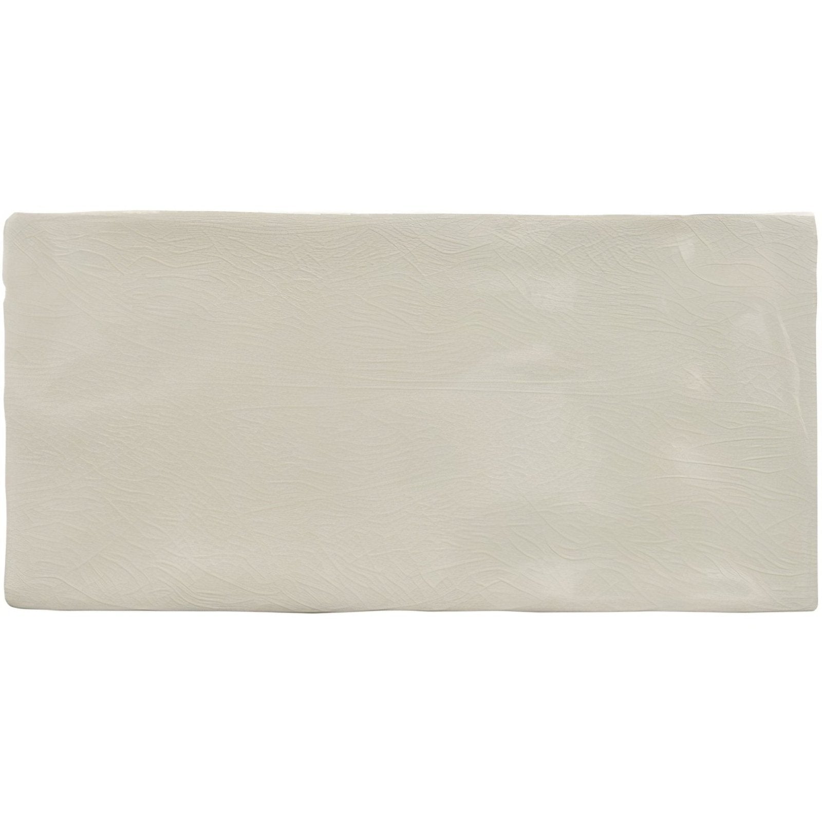 Cream-colored brick tile tern with a subtle textured surface for wall and flooring applications