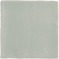 A square off-white ceramic field tile tern with a subtle crackled glaze finish perfect for wall and floor use