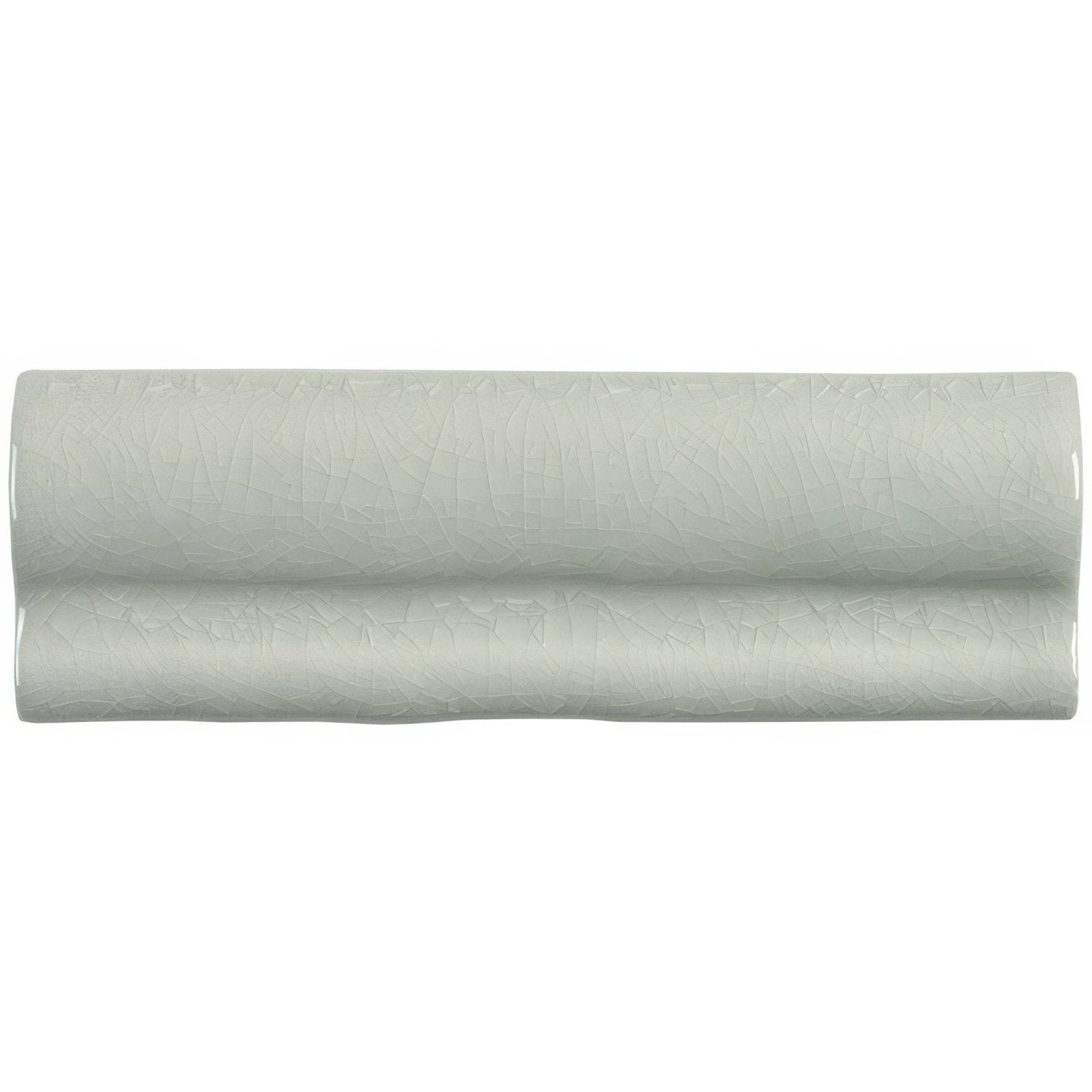 A sleek pale green ceramic torus moulding tern tile with subtle textured surface and gentle wave-like contours