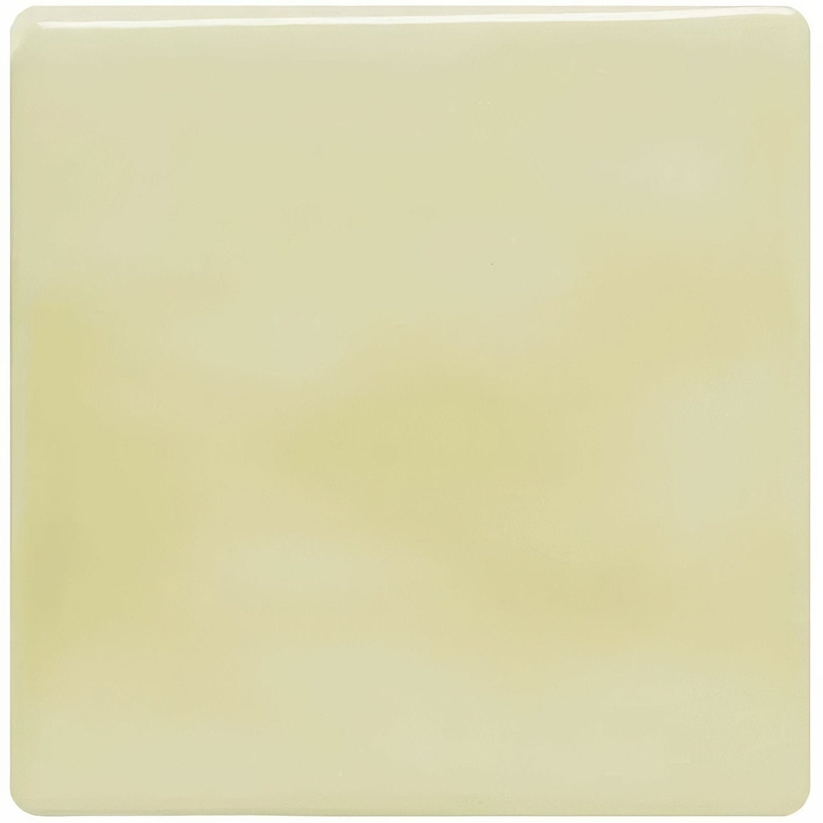 Thyme field tile is a smooth square tile with a glossy pale yellow surface ideal for wall or floor decor
