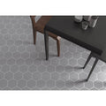 Gray hexagon matt floor tiles with white grout lines for a timeless and stylish flooring solution